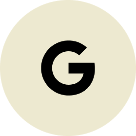 A black letter "G" in a sans-serif font is centered on a beige circular background.